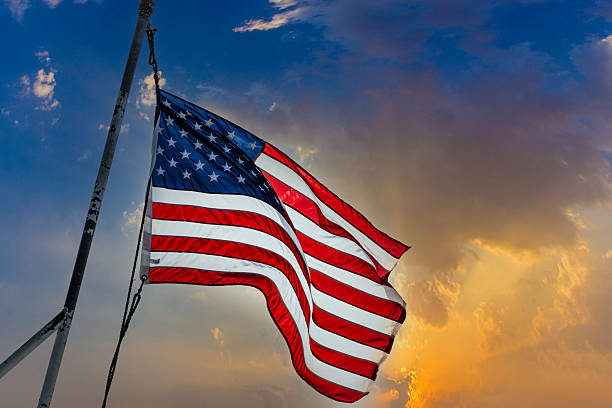 istock stars and stripes in sun with  dramatic sky background in sunset 2236021086