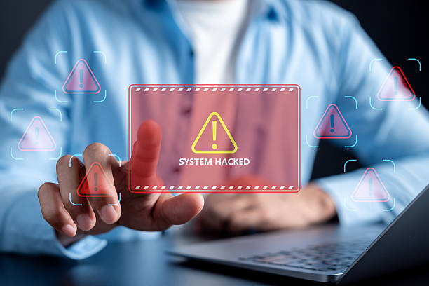 istock Cyber warning hacked alert on laptop screen with digital system breach, cyberattack, data security risk, online threat, and cybersecurity protection. 2236022874