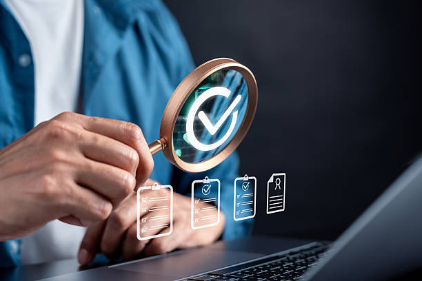 istock Digital signature and document approval concept. Magnifying glass with check mark verification, authentication, and compliance. Ideal for business, legal, and quality assurance content. 2236022887