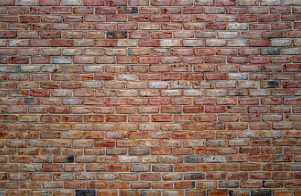 istock Brick wall made with bricks. Old red brick wall, masonry wall, stonework. Bric kwall background texture. Textured background of brickwall. Clinker brick. 2236024470