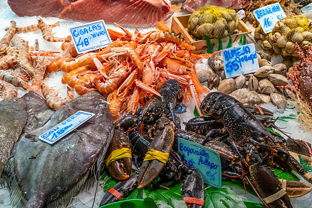 istock Market stall with fresh fish and seafood 2236024999