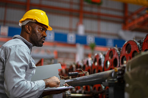 istock Engineer is working at metal sheet factory. 2236026704