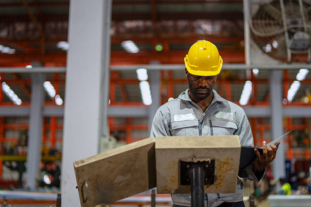 istock Engineer is working at metal sheet factory. 2236026729