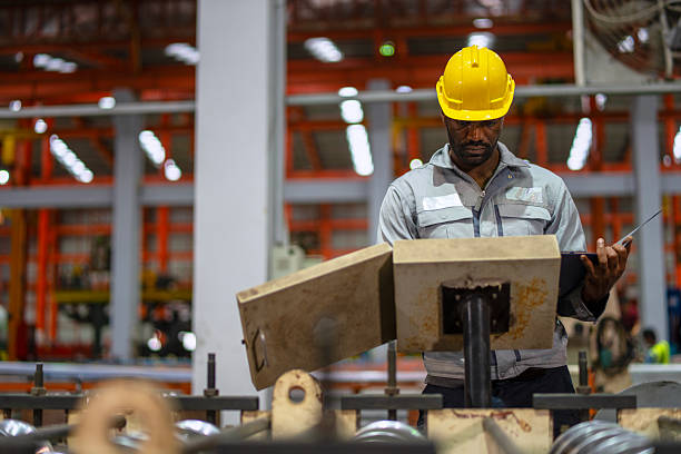 istock Engineer is working at metal sheet factory. 2236026735