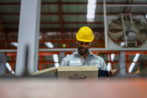 istock Engineer is working at metal sheet factory. 2236026737