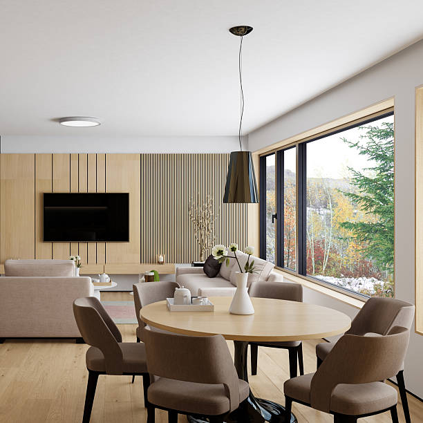 Elegant open-space apartment interior designed in modern Japandi style, featuring light pine wood flooring and wall paneling, minimalist furniture, and seamless integration of living, dining, and kitchen zones. The warm natural tones, clean lines, and large windows create a serene atmosphere ideal for showcasing architectural layouts, interior design variations, or lifestyle mockups across real estate platforms, smart home apps, and editorial content.