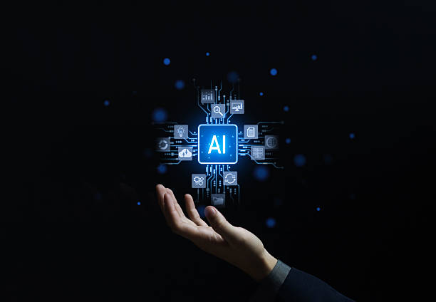 istock Hand holding glowing AI chip with digital icons, concept of artificial intelligence, future technology, machine learning, automation, data innovation, smart solutions, modern business transformation. 2236042956