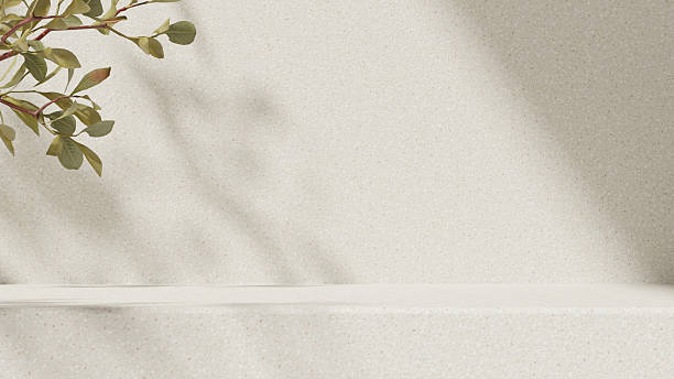 istock Podium display with greenery leaves and natural shadows 2236044128