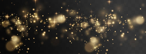 istock Magical golden stardust with soft glowing sparkles. Dreamy glitter trail featuring bokeh and blurred highlights 2236044686