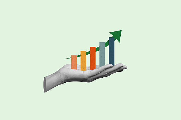 istock Hand holding business increases in the financial graph arrow. 2236044879