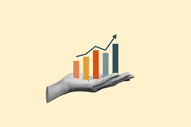 istock Hand holding business increases in the financial graph arrow. 2236045184