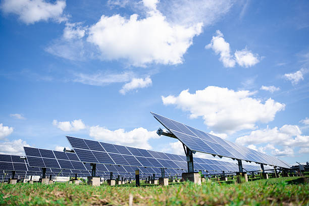 istock Durable ground-mounted solar panel installation designed for large-scale outdoor energy harvesting, optimized for farms, open land, and commercial renewable power generation 2236046369