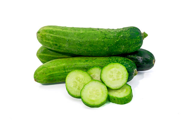 istock Fresh green cucumber with slices isolated on white background 2236047023