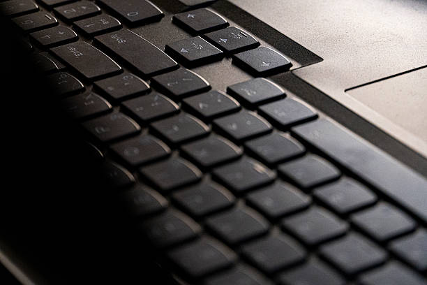 istock Close-up of laptop keyboard in soft light 2236047972