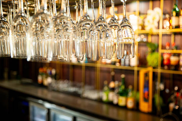 istock Hanging glass rack in a bar 2236053137