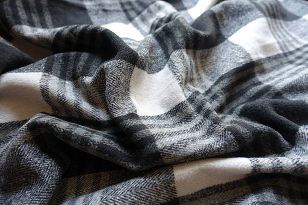 istock Draped black and white checkered cotton flannel fabric 2236054112