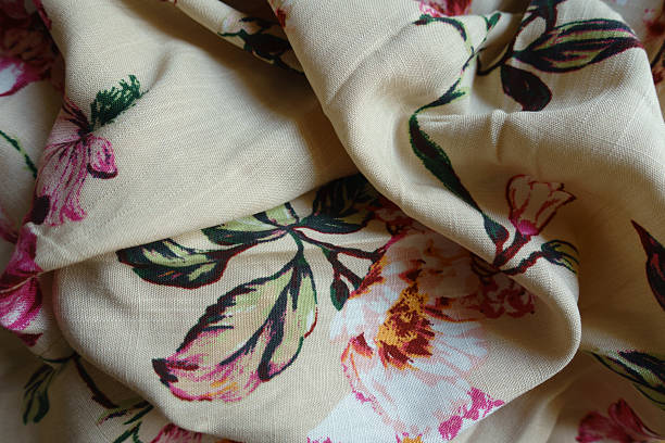 istock Soft folds on light beige, pink and green linen fabric 2236054224