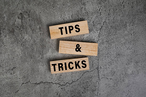 istock tips and tricks words on wooden blocks isolated on cement background 2236056208