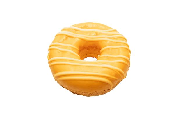 istock Yellow donut with mango flavor isolated on white background 2236059052