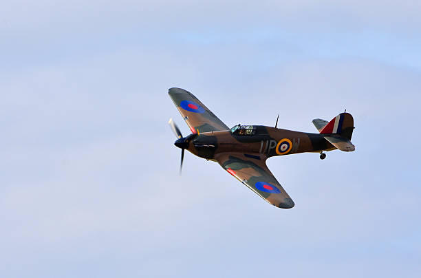 Little Gransden, Cambridgeshire, England - August 24, 2025: Vintage Hawker Hurricane world war 2 fighter plane in flight