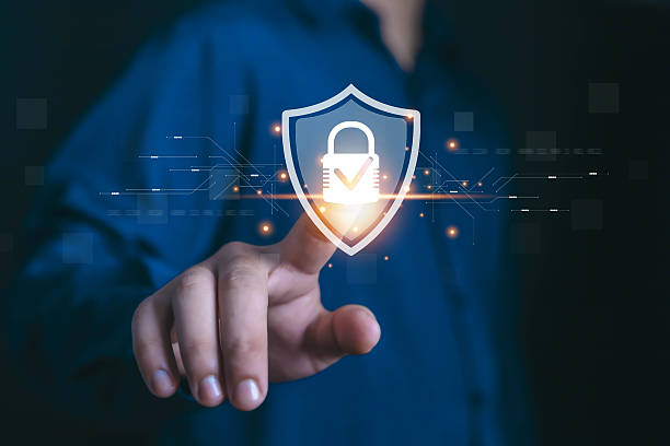 istock Businessman finger touching digital shield with padlock icon, concept of cybersecurity, data protection, privacy, encryption, secure network, information security, and online safety technology. 2236064359