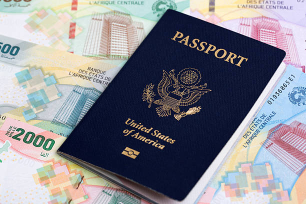istock American passport on Central African CFA money 2236064410