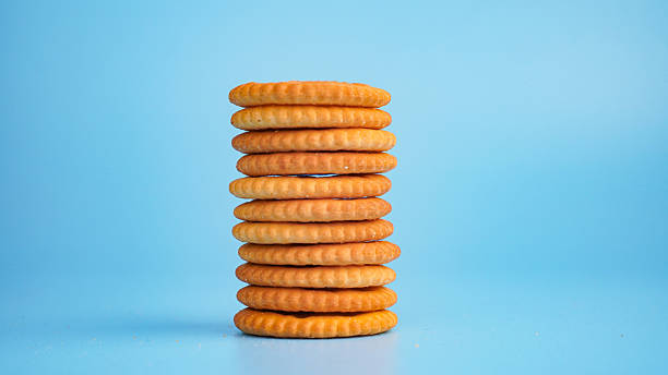 istock Stacked cookies showing a profit or a building 2236064596