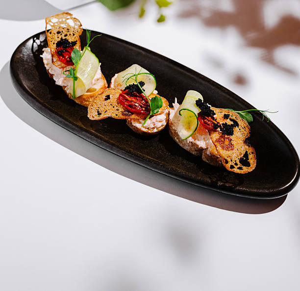 istock Delicate seafood dish served on a sleek black plate at a fine dining restaurant 2236064643
