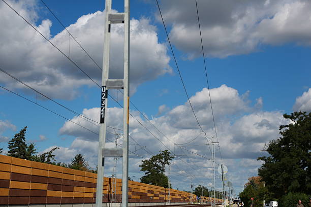 Railway overhead lines electrical wires with noise protection wall