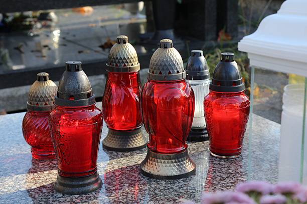 istock Candles at a cemetery on All Saints Day in Poland 2236068027