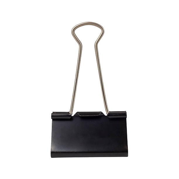 istock A single black metal binder clip is prominently displayed against a clean white background. 2236069086