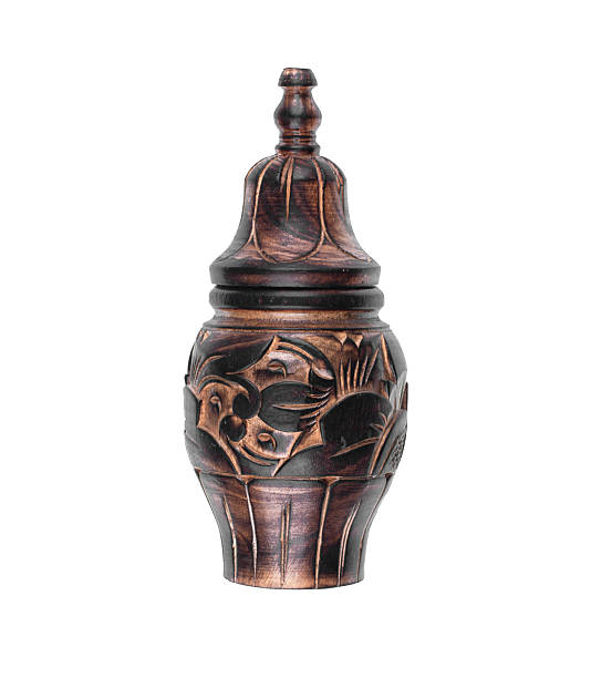 istock Wooden urn for ashes isolated on white background 2236070179