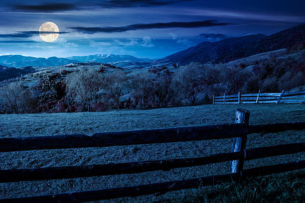 istock mountainous rural landscape in autumn at night 2236070567