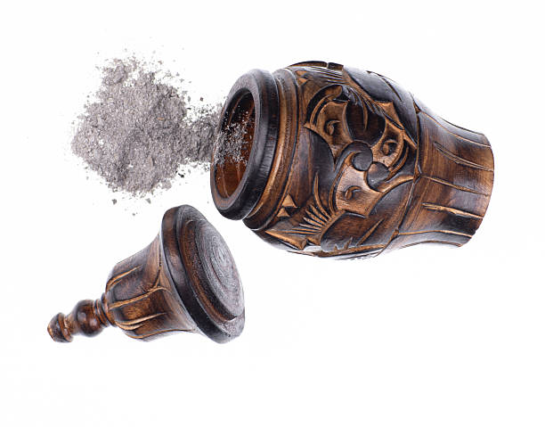 istock Wooden urn for ashes isolated on white background 2236070929