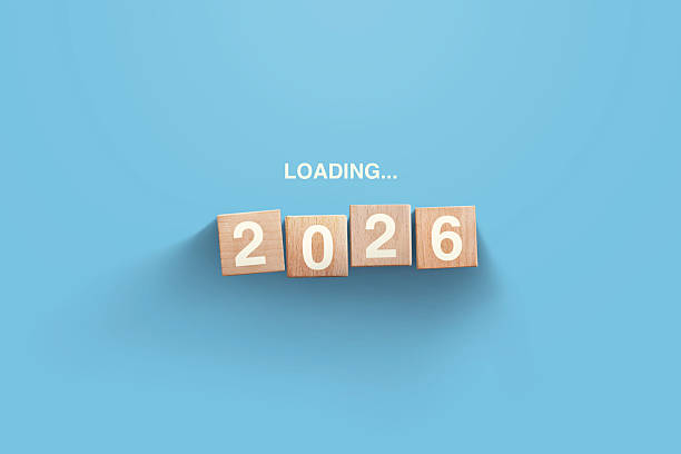 istock 2026 New Year Loading. Loading bar with wooden blocks 2026 on blue background. Start new year 2026 with goal concept, action plan, strategy, new year business vision 2236070946