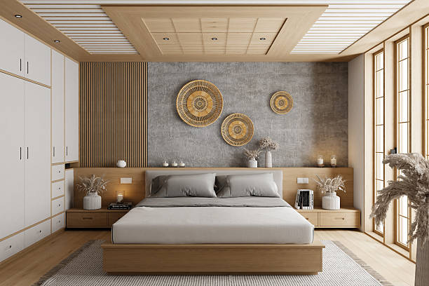 Modern Japandi-style bedroom featuring a light wood bed frame, built-in nightstands, and a serene palette of beige, gray, and white. The wall behind the bed combines vertical wood slats with concrete-textured panels, accented by woven circular decor. Natural light filters through sheer curtains, enhancing the calm ambiance. This image is ideal for use in interior design portfolios, furniture catalogs, lifestyle branding, or smart home app interfaces where material contrast and minimalist styling are key.