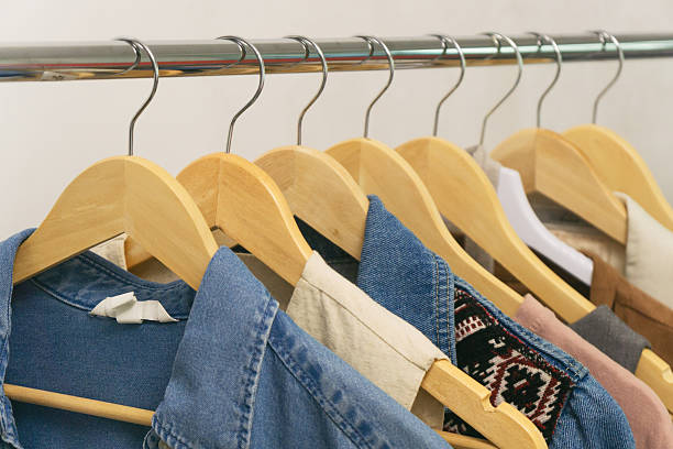 istock Unique styles of upcycled second-hand denim displayed on hangers in a chic boutique setting 2236075411