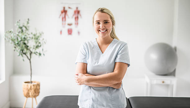 istock nice blond physiotherapist woman at job 2236078182