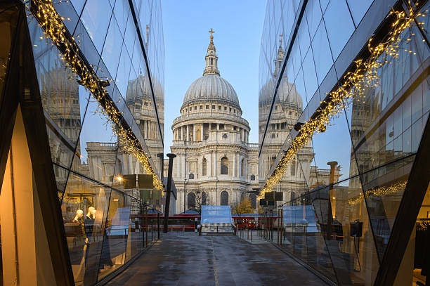 istock Morning light over Saint Paul Cathedral in London with blurred figures passing by 2236078392