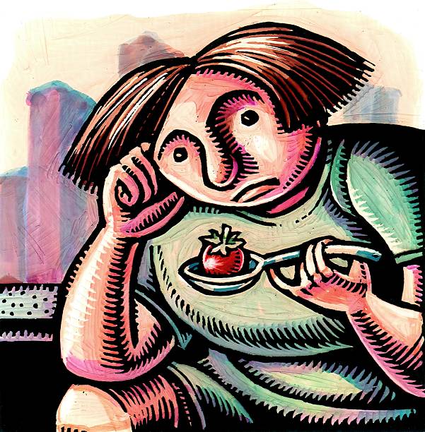 istock woman holds strawberry in a spoon 2236080948