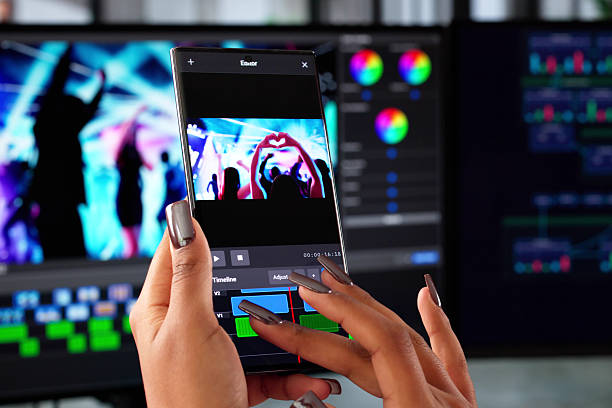 istock Female Video Editor Uses Phone App 2236081072