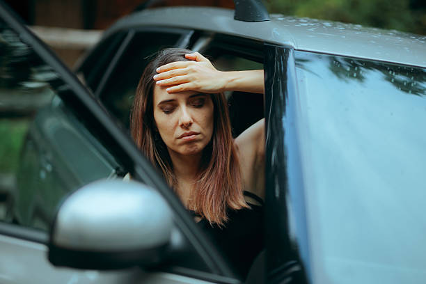 istock Woman Suffering a Headache Being Dizzy from Carsickness 2236082912