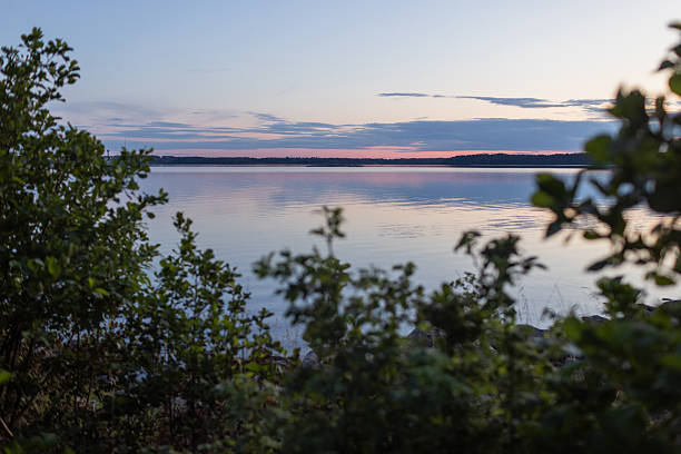 istock Sunset over a Swedish lake landscape 2236084426