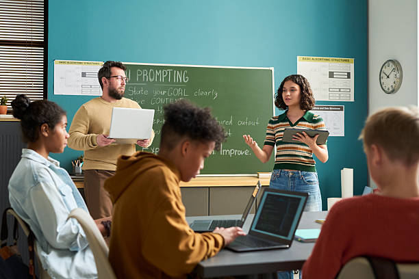 istock Multiethnic Group of Teenagers Collaborating during Classroom Presentation 2236088213