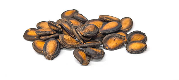 istock Dried watermelon seeds for snack on white background 2236089870