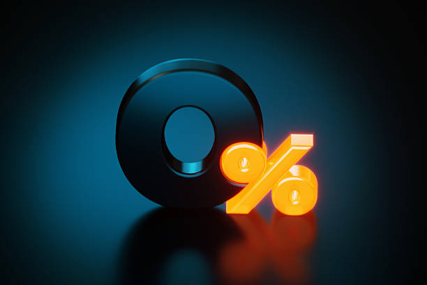 Black colored zero percent symbol on dark blue background. Horizontal composition with selective focus and copy space.