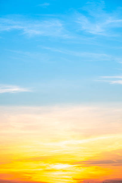 istock Beautiful , luxury soft gradient orange gold clouds and sunlight on the blue sky perfect for the background, take in evening,Twilight, Large size, high definition landscape photo,Vertical 2236091200