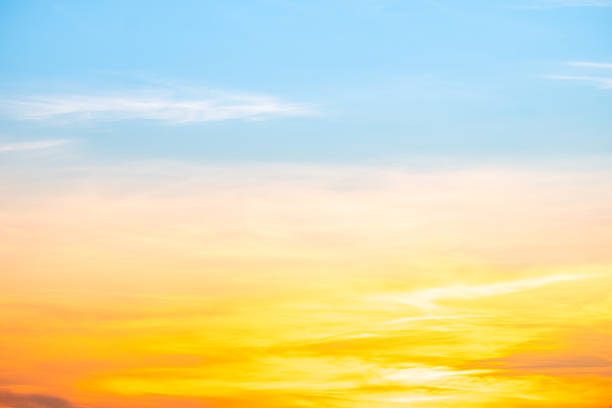 istock Beautiful , luxury soft gradient orange gold clouds and sunlight on the blue sky perfect for the background, take in evening,Twilight, Large size, high definition landscape photo 2236091274