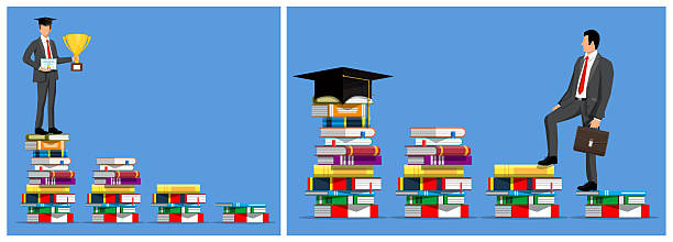 istock Man graduate standing on top of book pile 2236095476