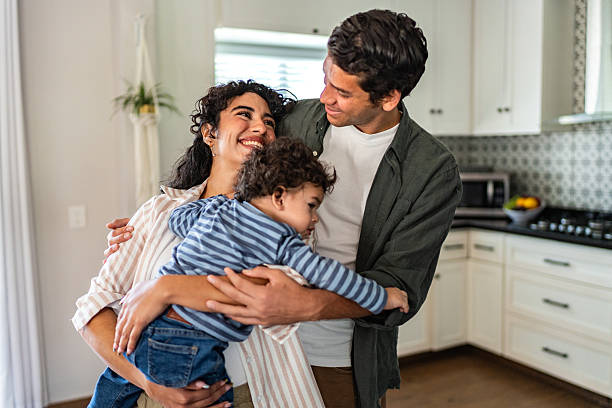 istock Parents with baby son at home 2236097347